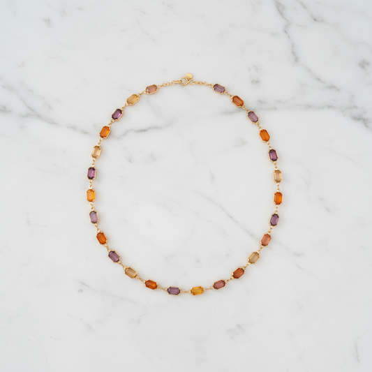 Collana arancio-viola - sfondo marmo 1:1